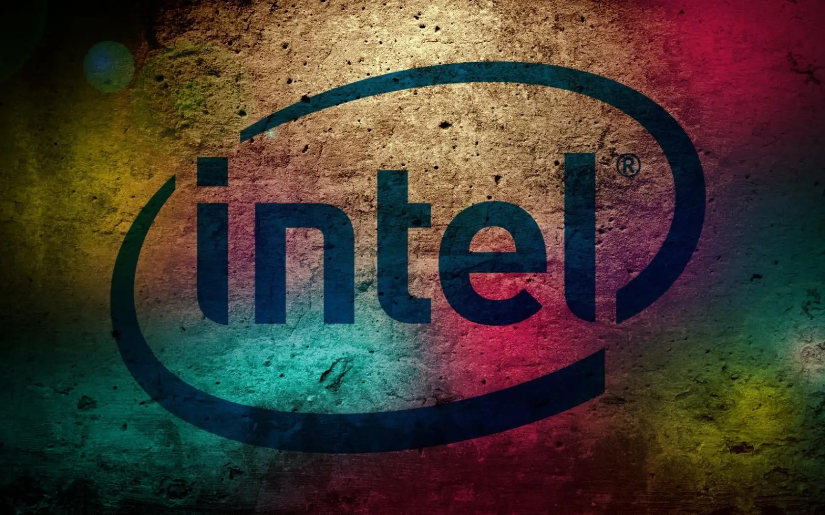Colorful Intel logo on grungy textured background.