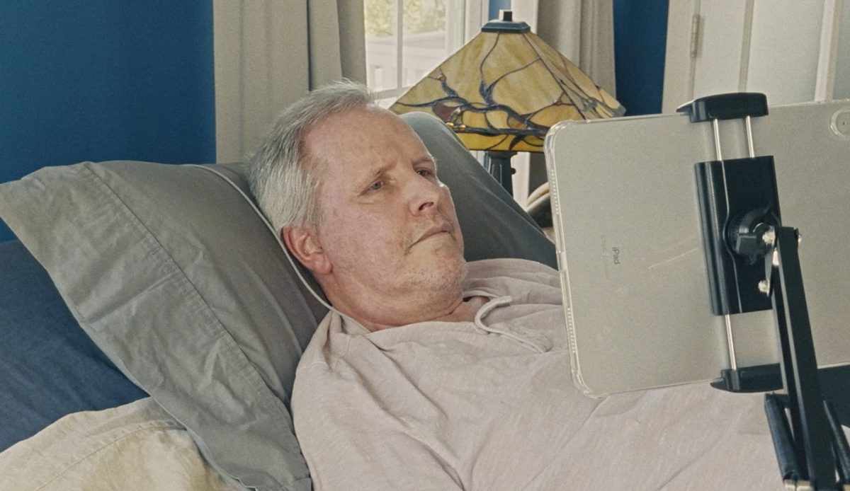 Man with ALS using thought‑driven brain‑computer interface to navigate iPad