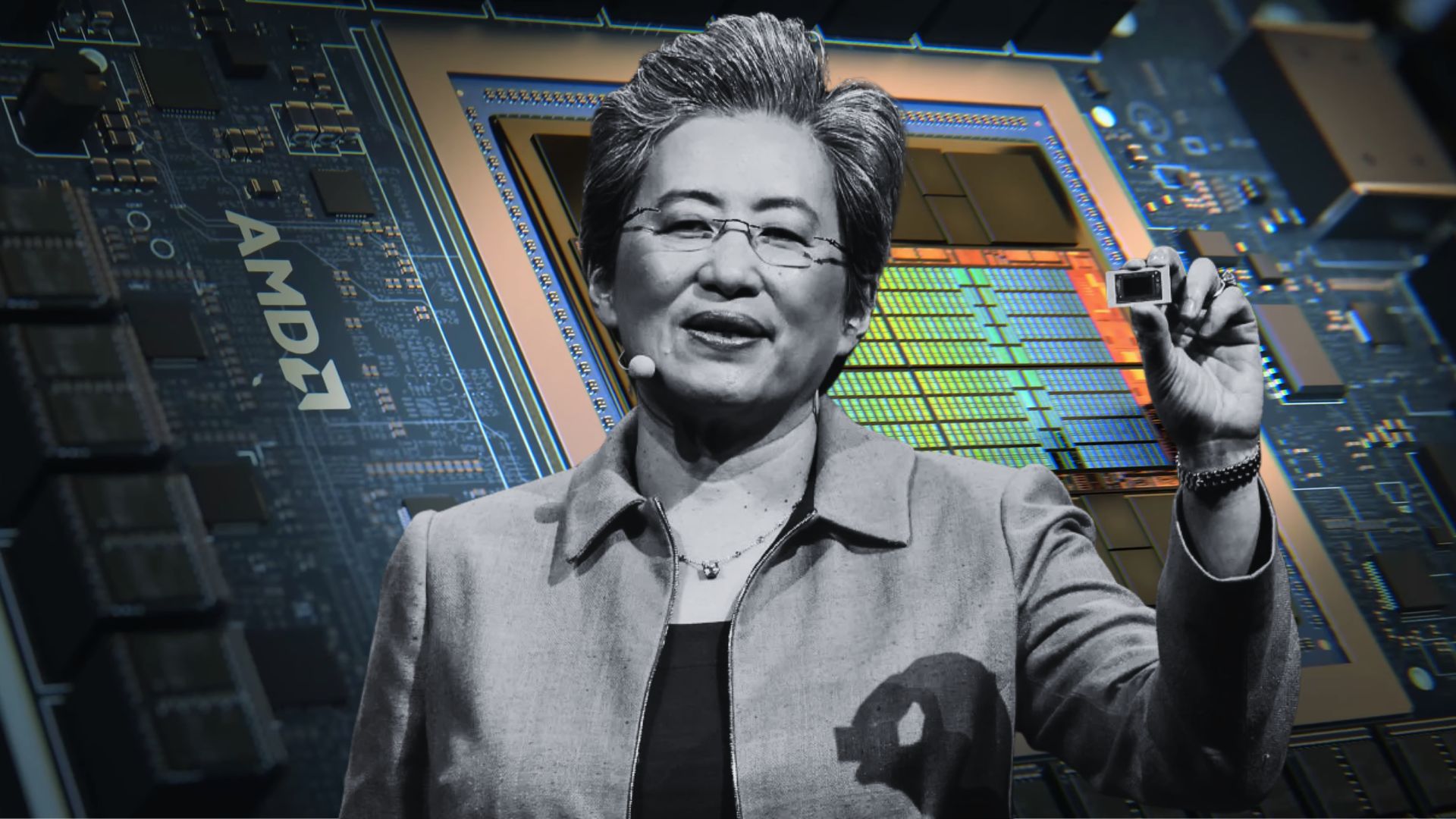Person presenting AMD chip technology at a tech event.