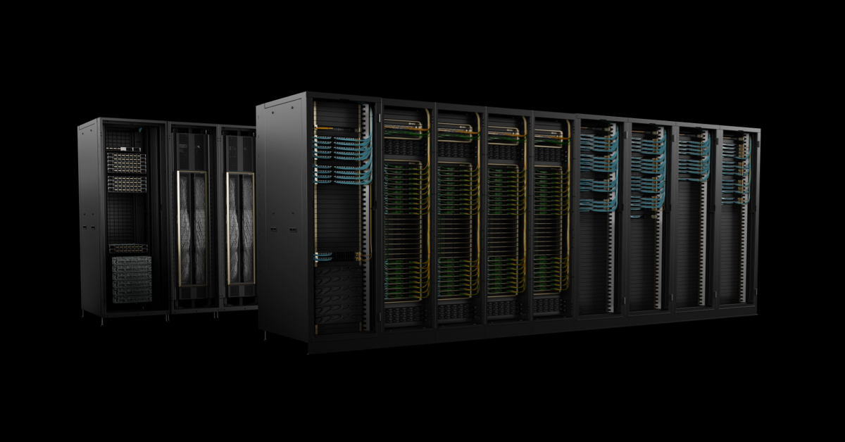 Black server racks with cables in a data center setup.