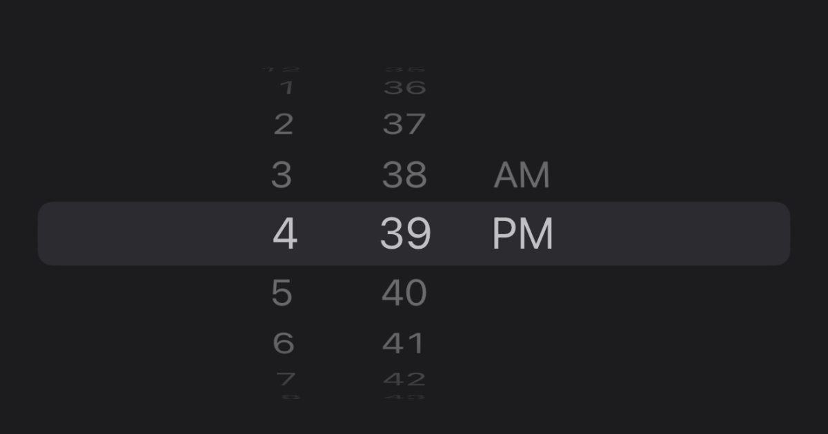 Close-up of iPhone alarm picker that looks like a wheel but actually stops scrolling at 4:39.