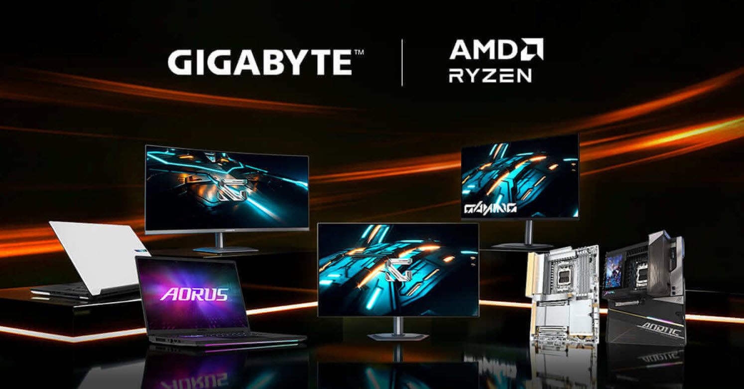 Gigabyte and AMD Ryzen branded products including monitors, motherboards, and AORUS laptops are displayed against a dark