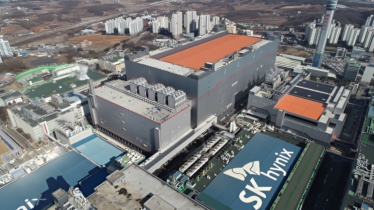 An aerial view of the SK hynix semiconductor manufacturing facility with multiple large factory buildings and an