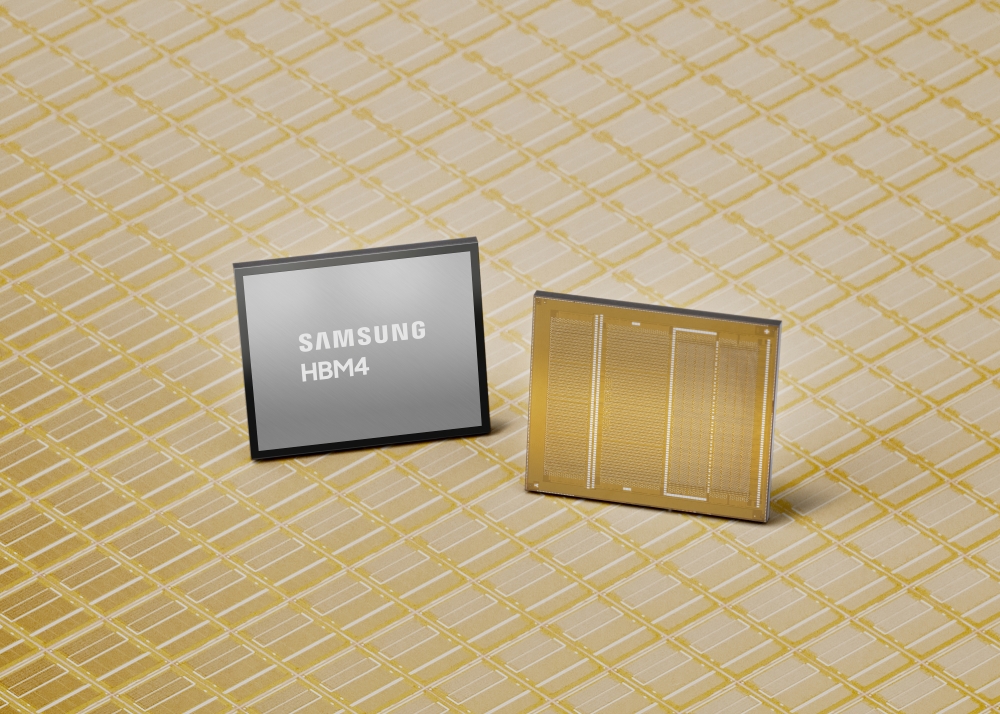 A Samsung HBM4 memory chip displayed on a patterned yellow surface.