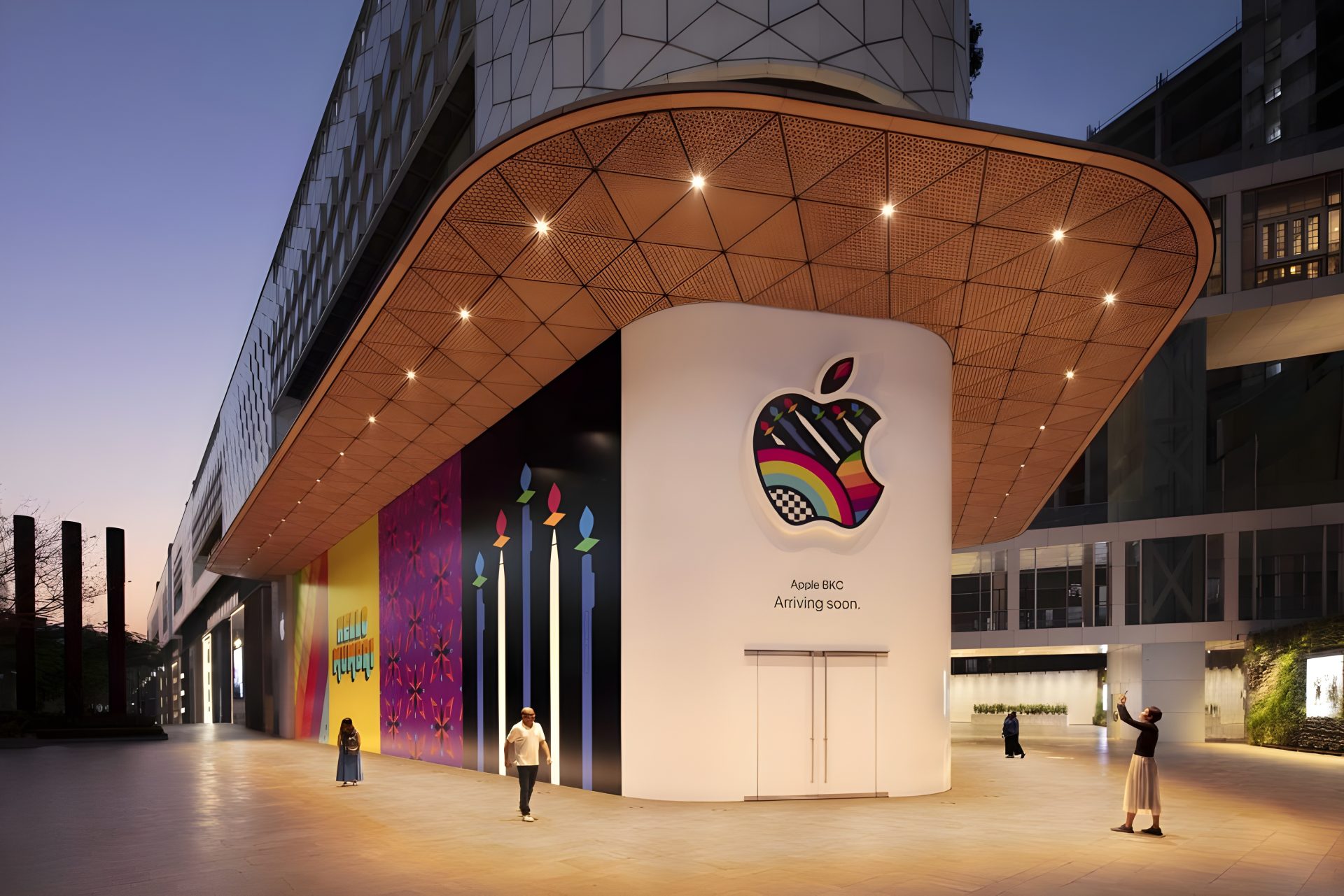 The exterior of an upcoming Apple store with a colorful Apple logo and the text 'Apple BKC Arriving soon.'