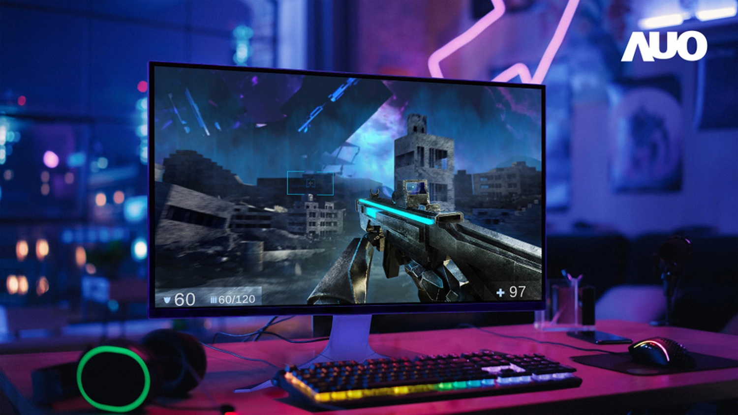 A gaming setup features a monitor with the AUO logo displaying a first-person shooter game, showing a futuristic rifle aimed at ruined buildings, and UI elements with '60' and '97' visible.