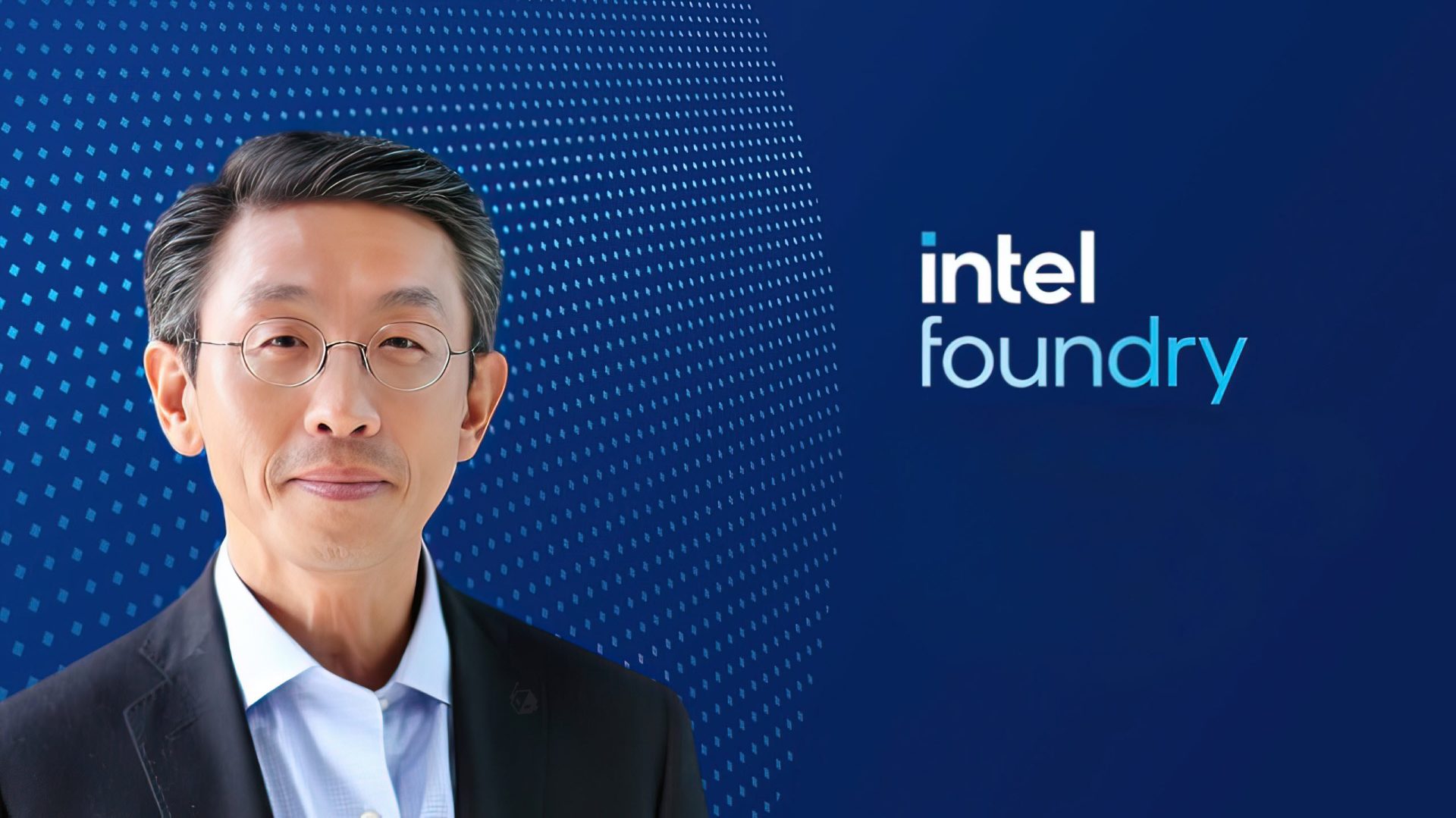A person in glasses is in front of a blue dotted background with the text 'Intel Foundry' visible.