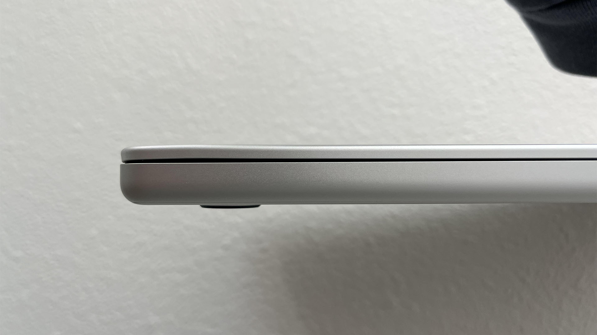 An owner's MacBook got damaged during airport security run