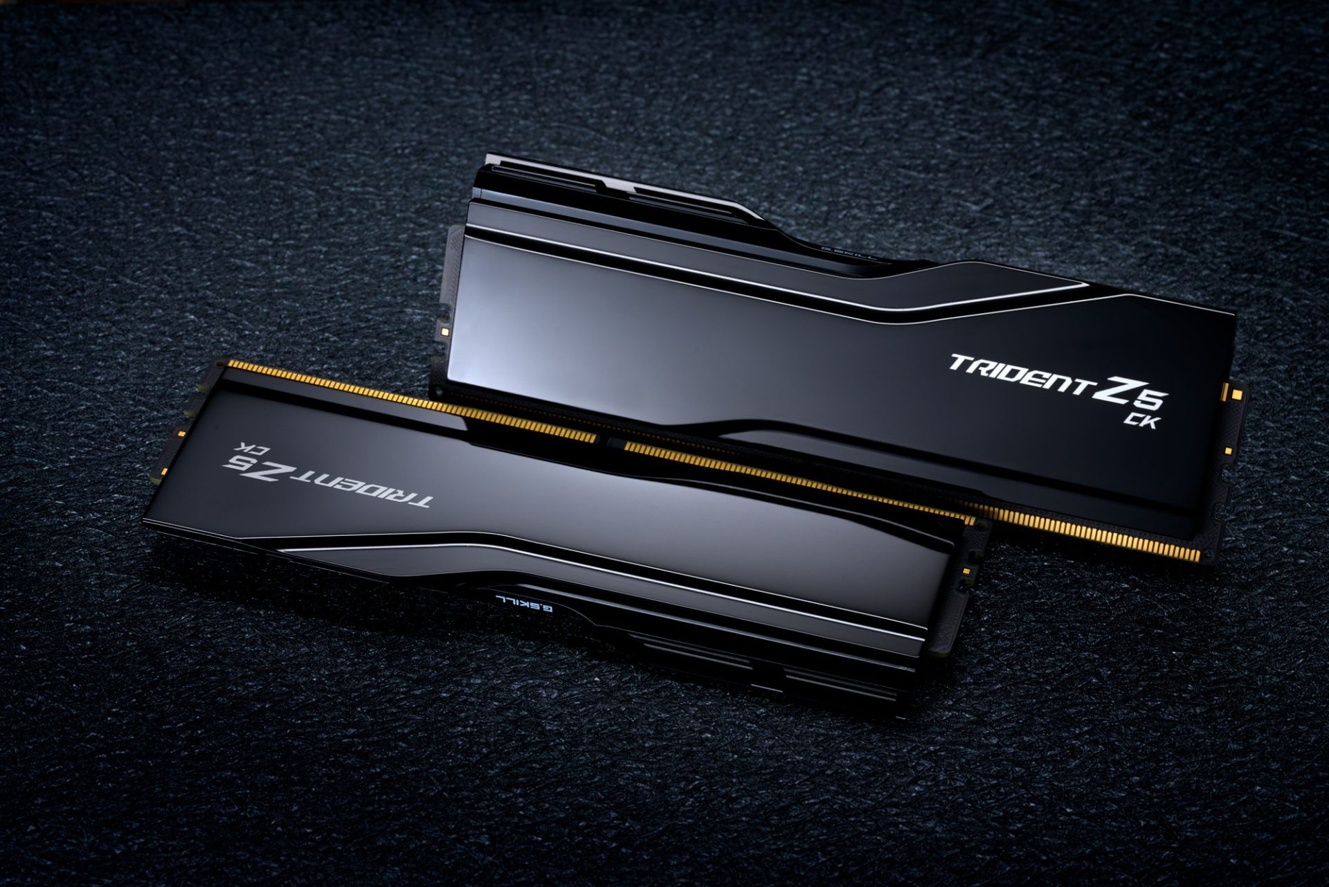 Two G.Skill Trident Z5 CK memory modules are displayed against a dark textured background.