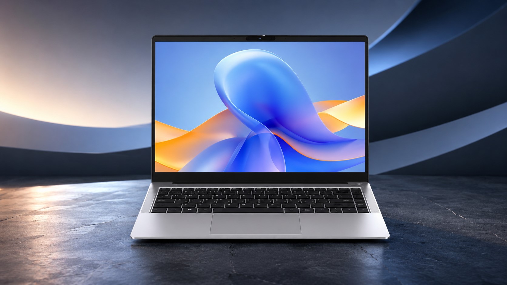 A sleek unbranded laptop on a dark surface displays a vibrant abstract wallpaper on its screen.