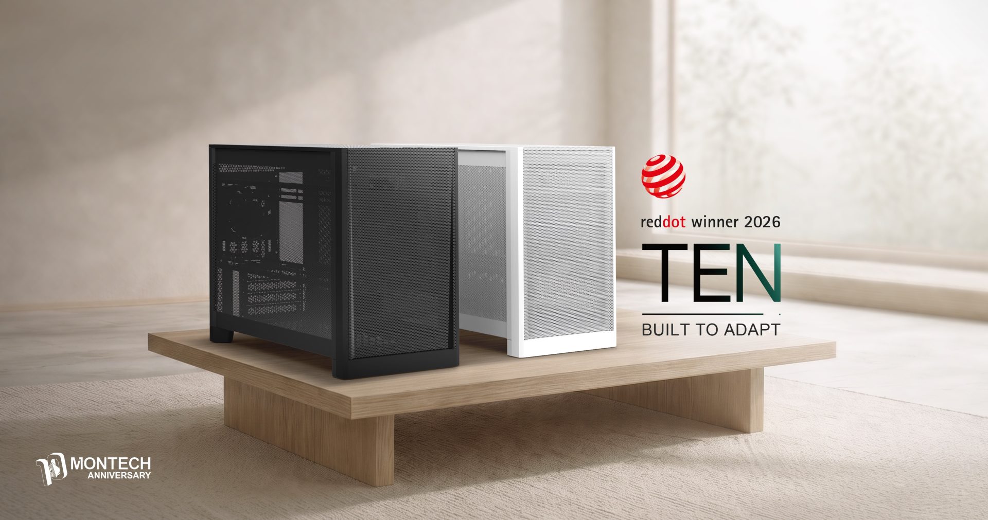 Two Montech PC cases, one black and one white, are displayed on a wooden platform with text 'reddot winner 2026' and 'TEN BUILT TO ADAPT' alongside the Montech anniversary logo.