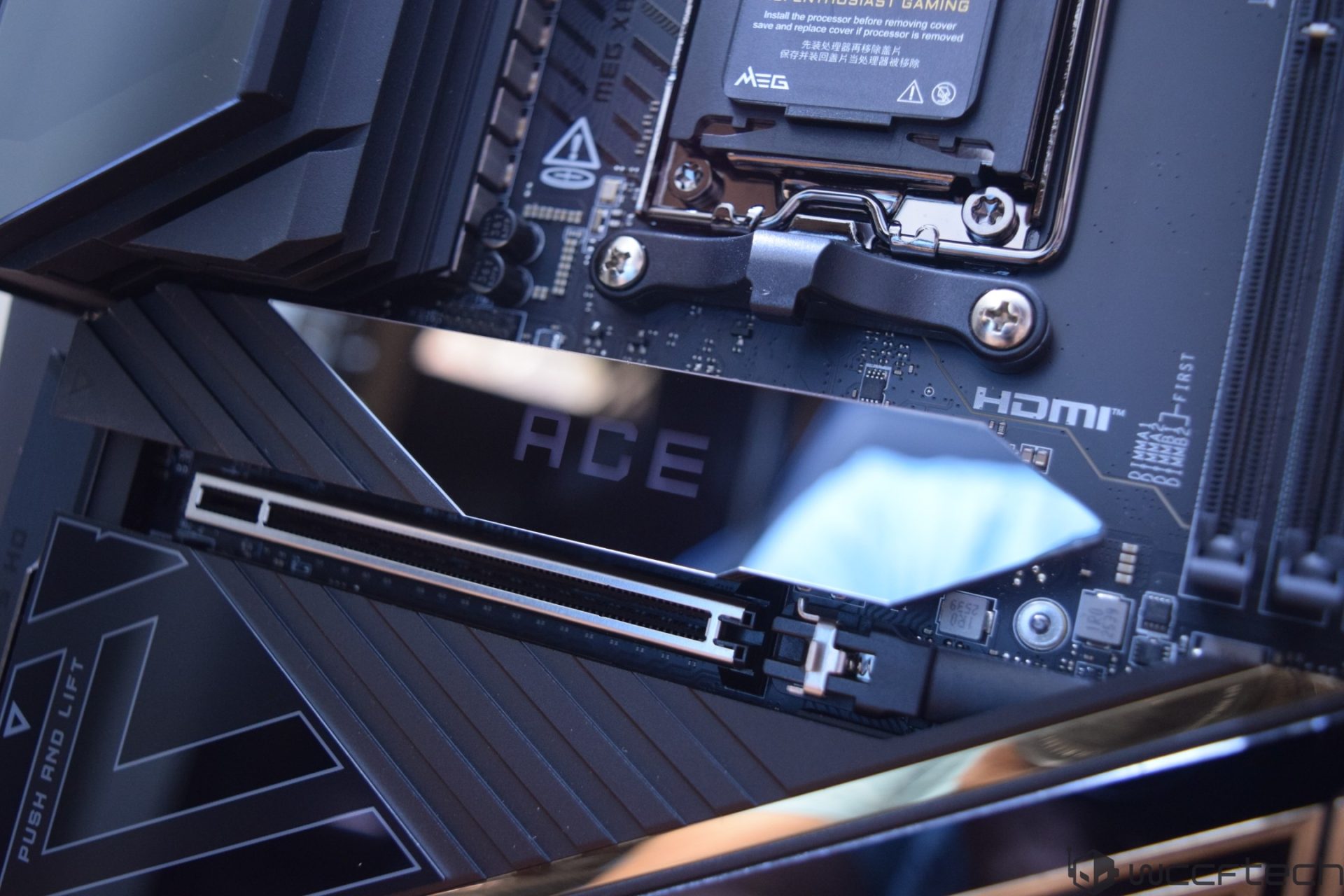 A close-up of the MSI MEG ACE X670E motherboard showcasing its CPU socket area and PCIe slots with ‘ACE’ branding.
