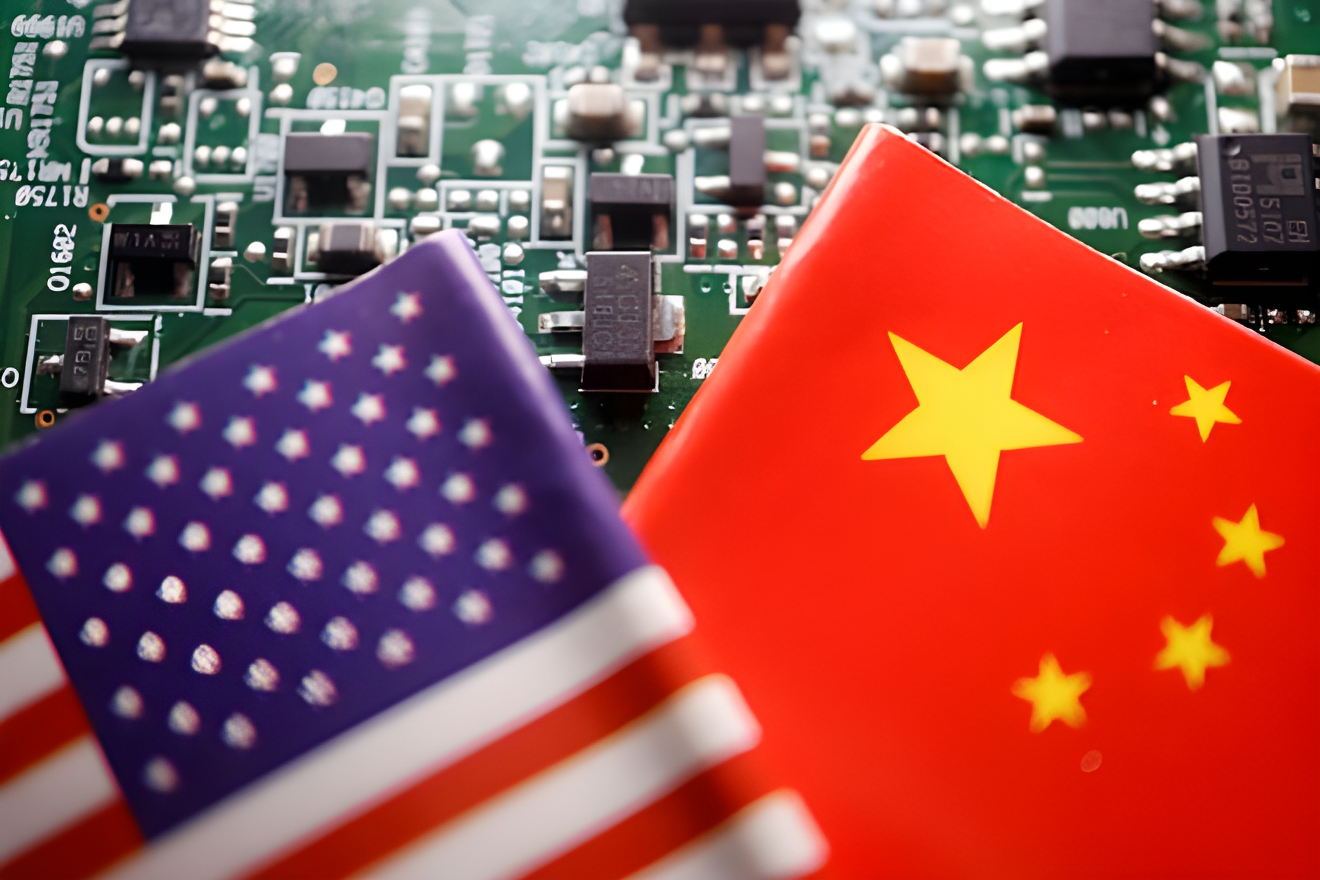 The image shows the flags of the United States and China overlapping on a blurred circuit board background.