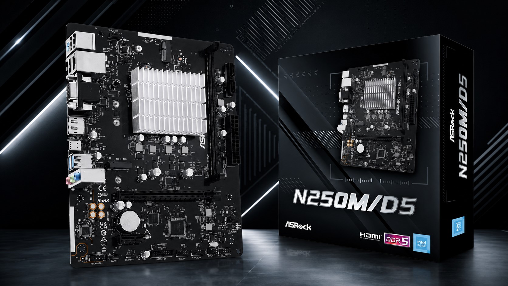 ASRock N250M/D5 motherboard showcased next to its retail box with visible logos for DDR5 and Intel Inside.
