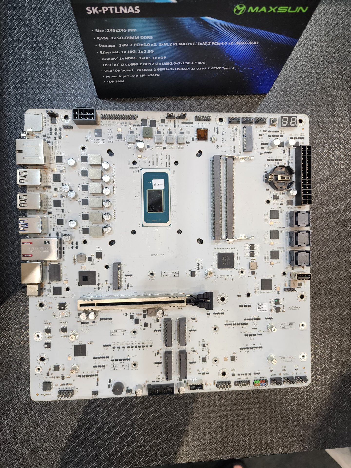 A MaxSun SK-PTLNAS motherboard is shown, featuring a visible Intel processor socket and various connectivity ports, alongside a specification card noting features such as 'DDR5' and '2.5G Ethernet'.