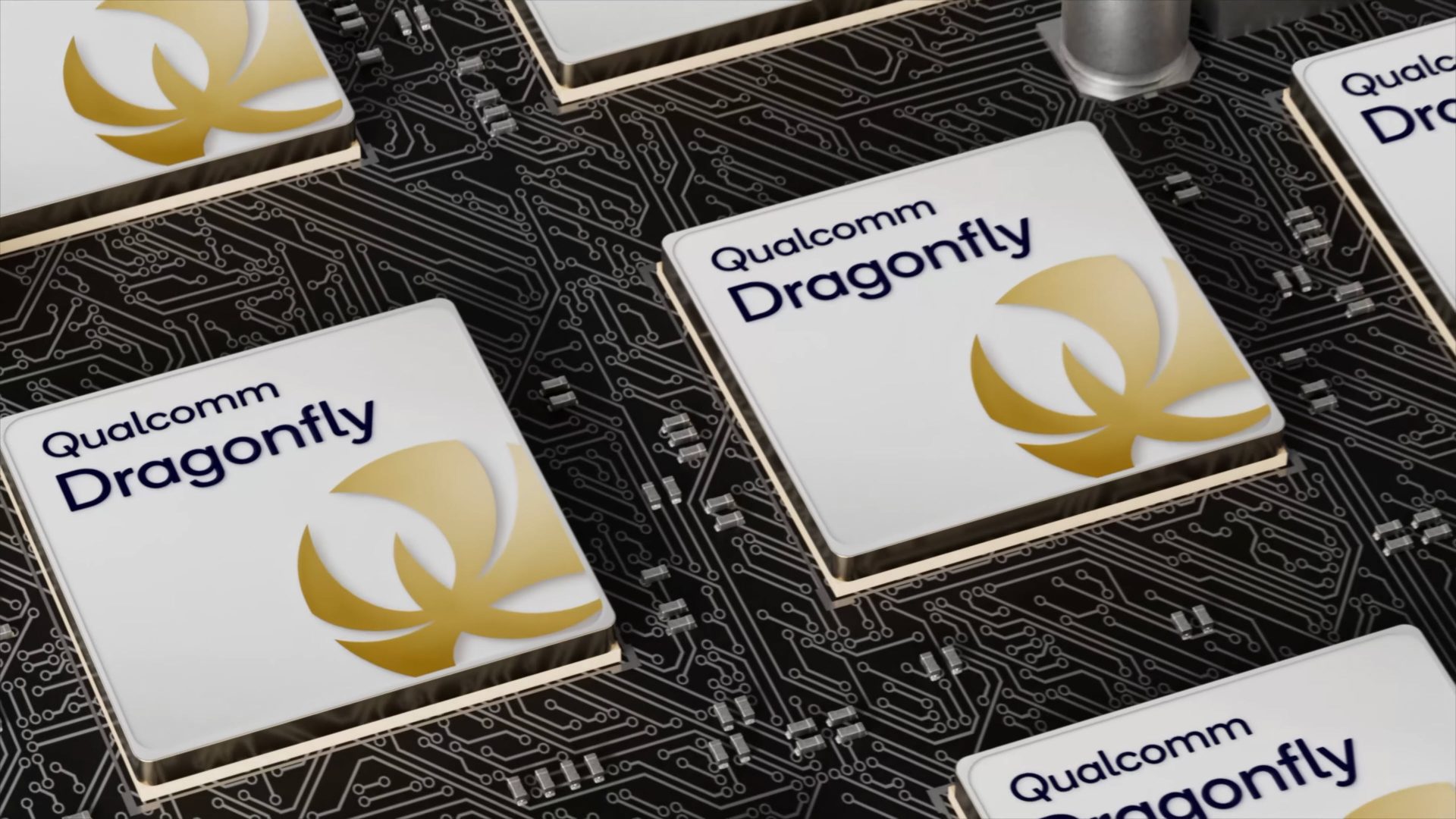 Several Qualcomm Dragonfly chips are arranged on a circuit board, featuring a gold dragonfly logo.