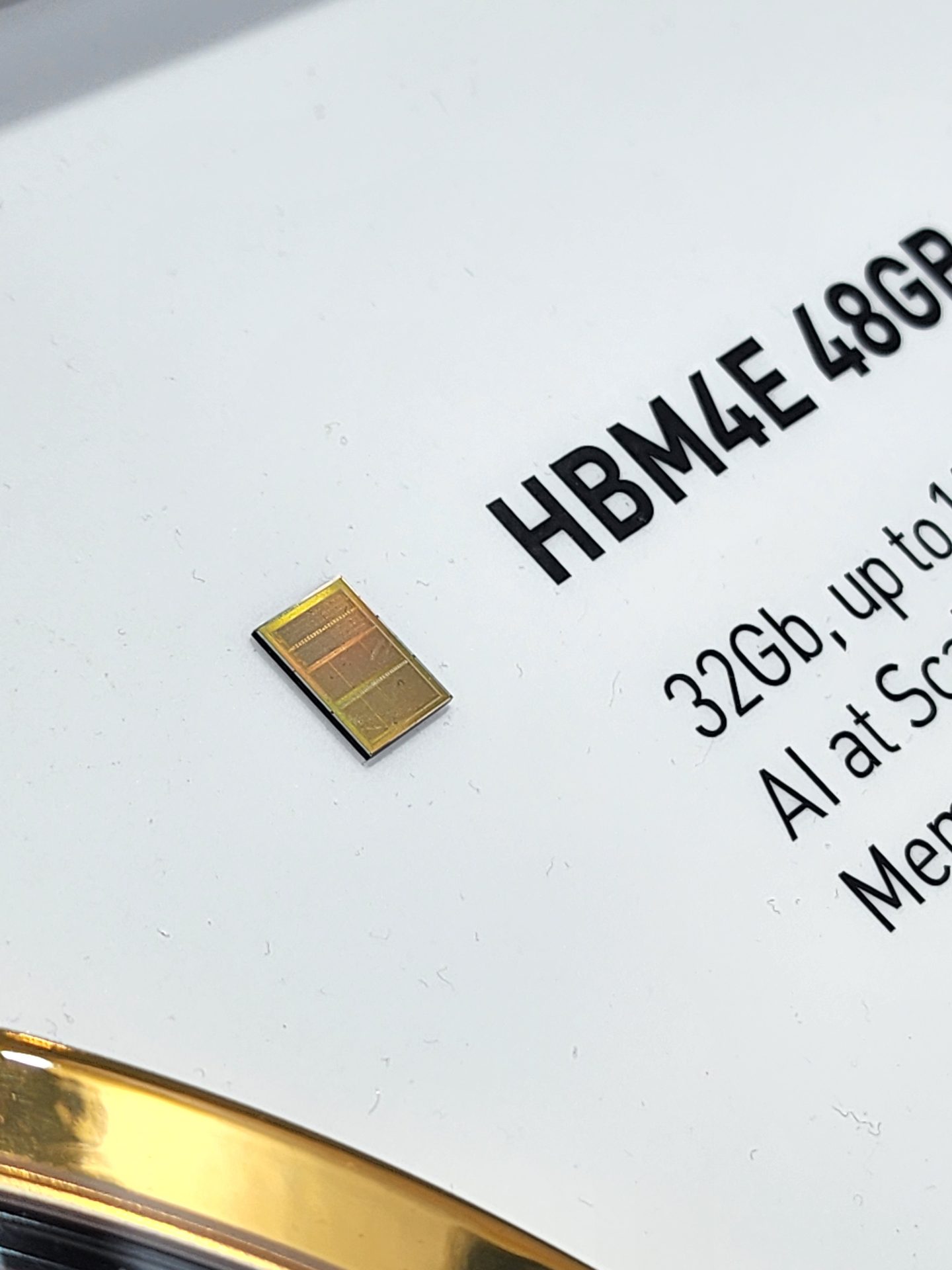 A close-up of an HBM4E chip next to the text 'HBM4E 48GB' and '32Gb, up to 10 AI at Scale.'