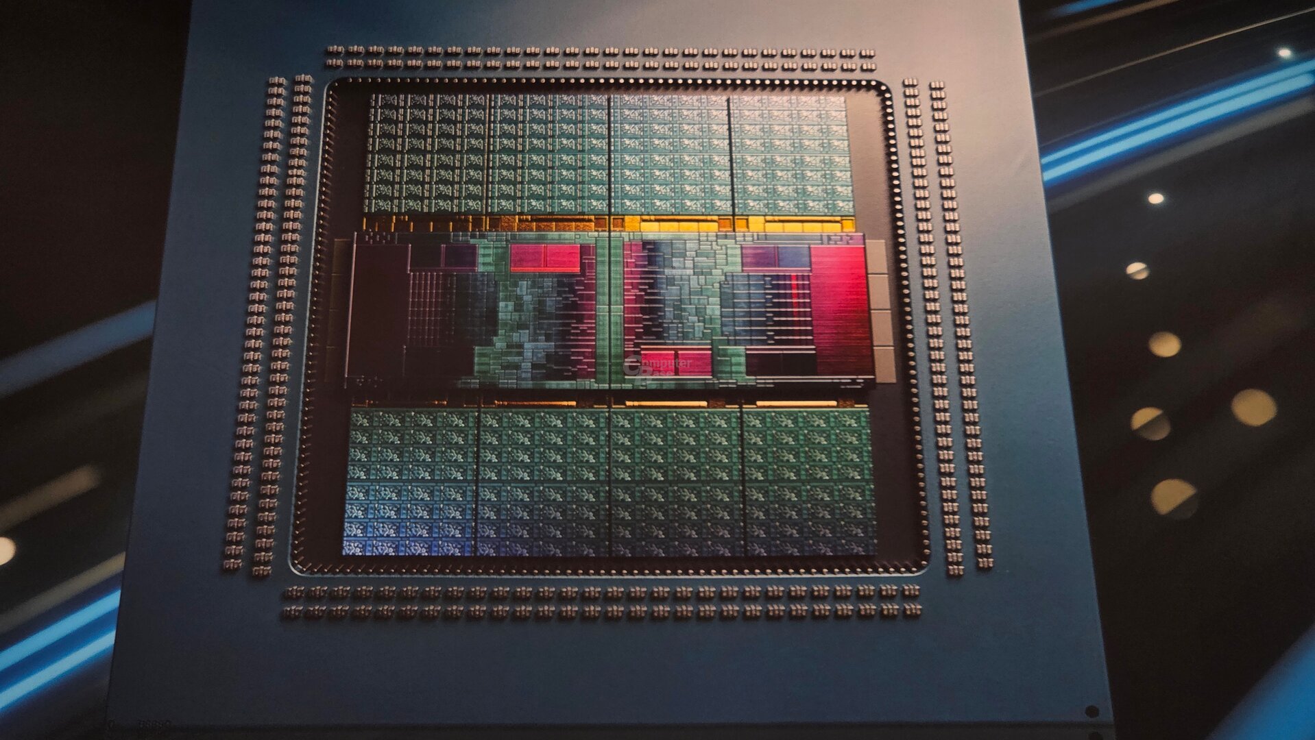 A close-up view of an AMD computer chip showcasing intricate circuit patterns and component details.