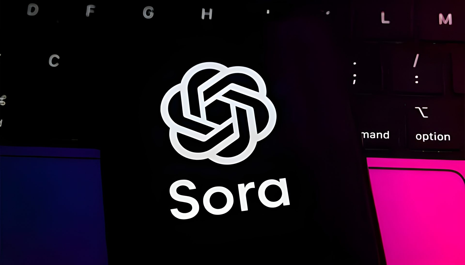 Sora logo on screen above a keyboard with partially visible keys.