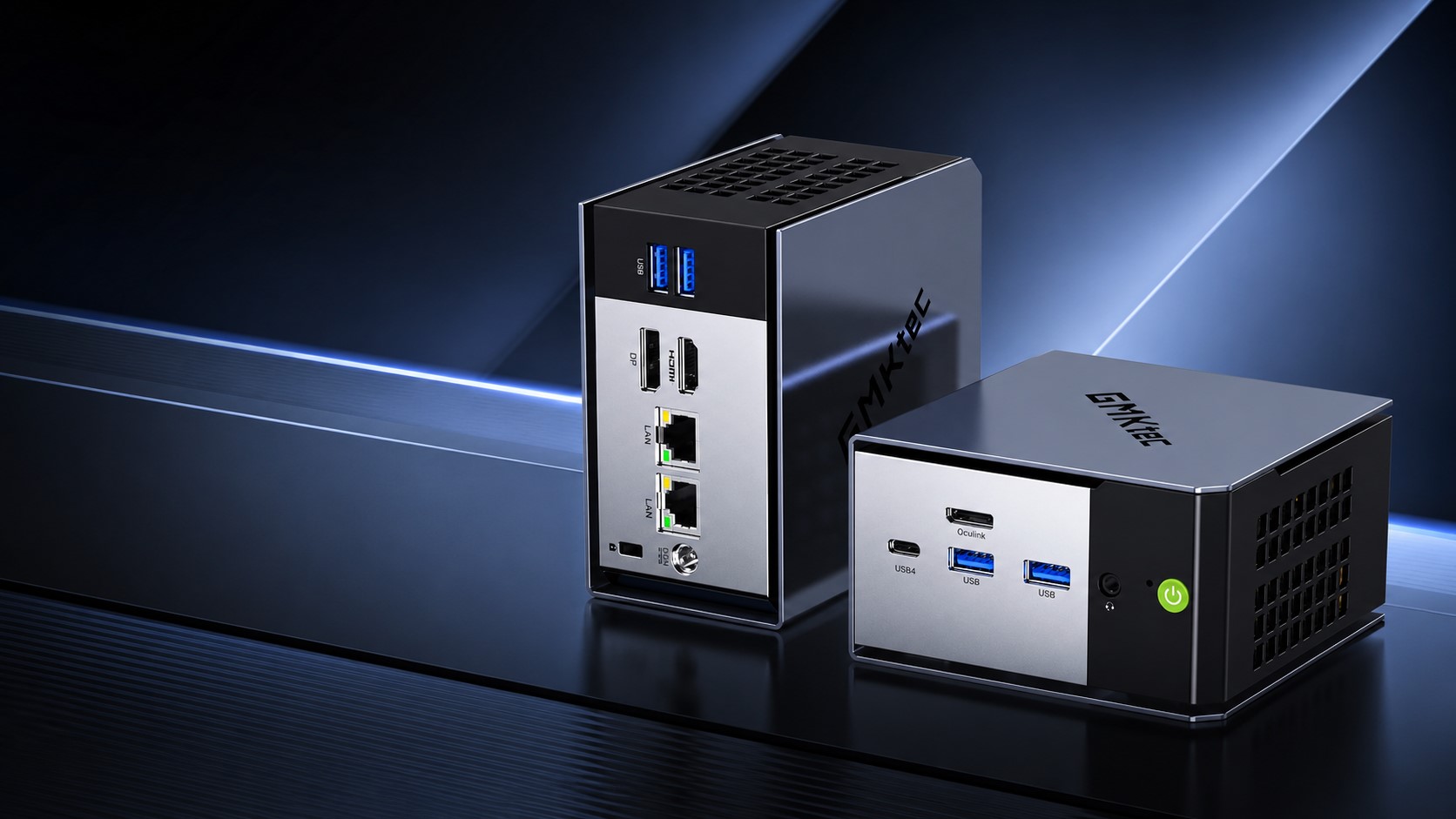 Two GMKtec mini PCs are displayed, featuring multiple ports including HDMI, USB4, USB3, and LAN, with visible branding on both devices.