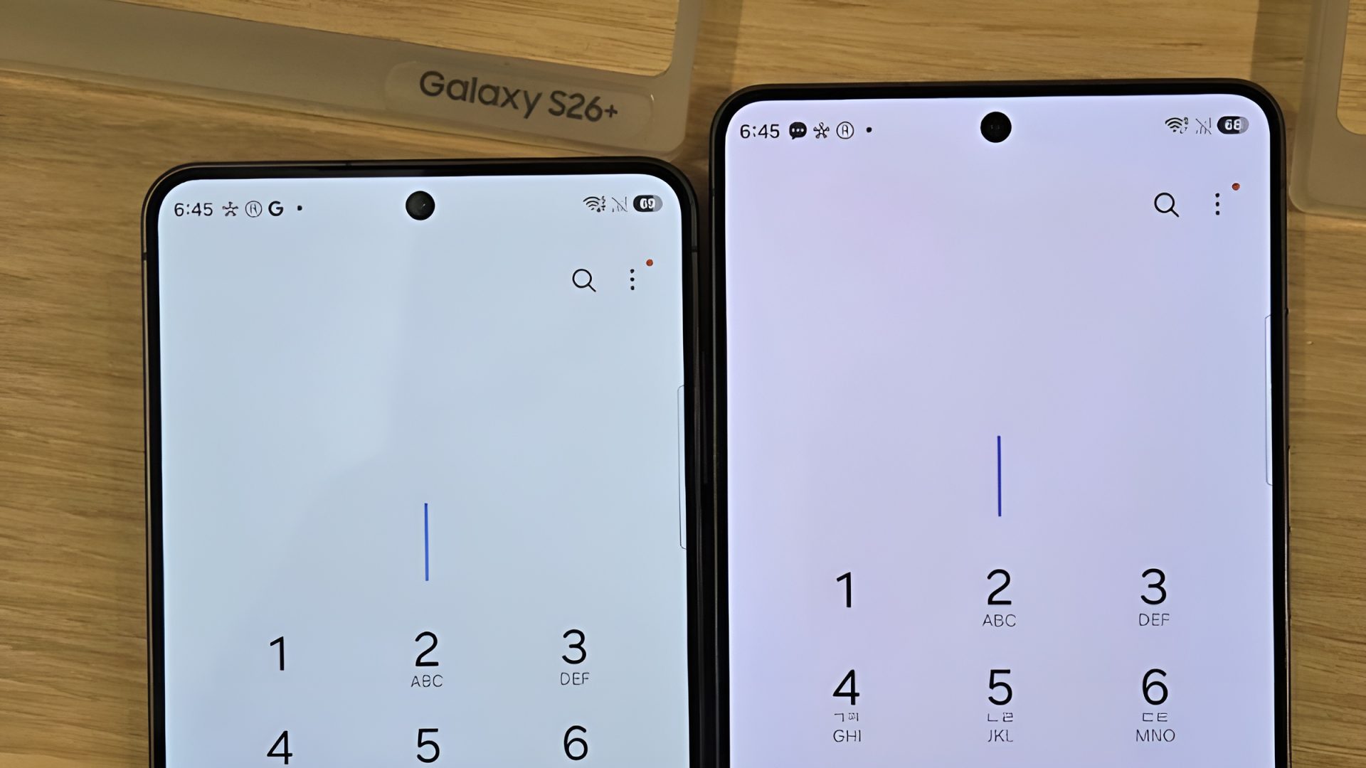 Two smartphones with punched-hole cameras display numeric keypads, labeled as 'Galaxy S26+'.