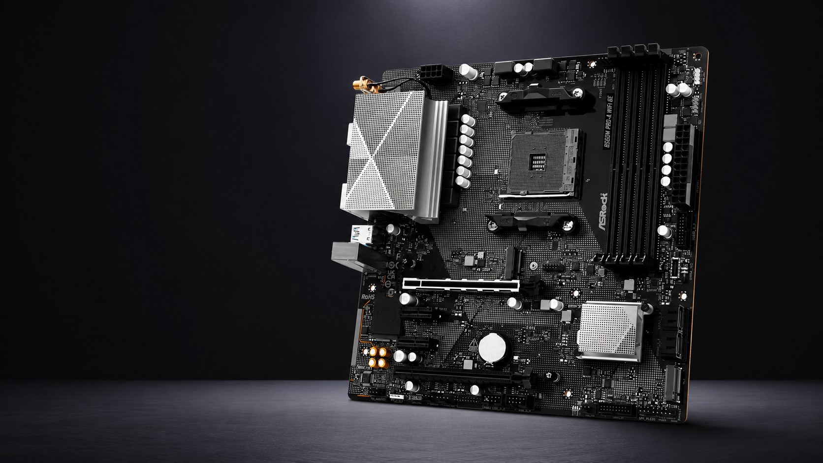 An ASRock B550M Pro4 WiFi BT motherboard is shown against a dark background.