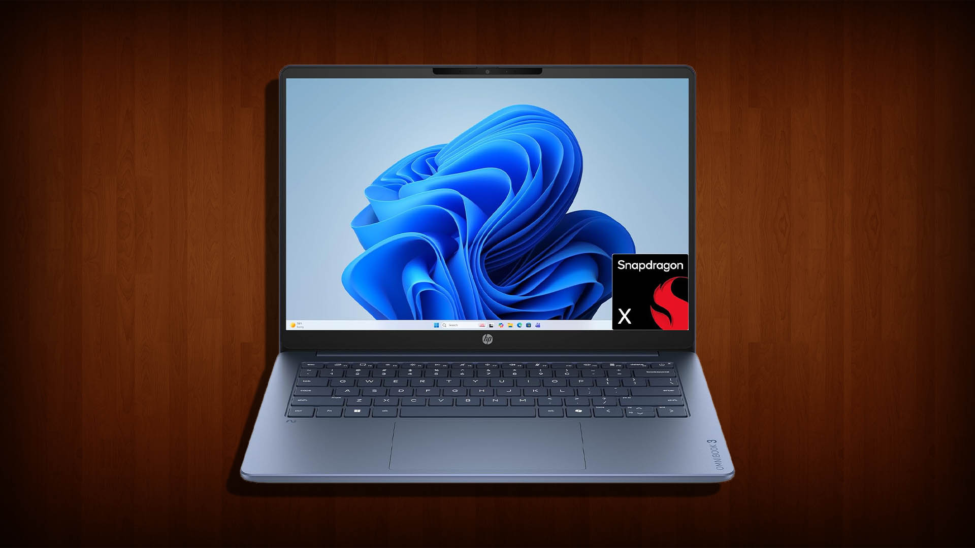 HP OmniBook 3 Snapdragon X laptop open on a desk showing its display and keyboard as an affordable MacBook Neo alternative
