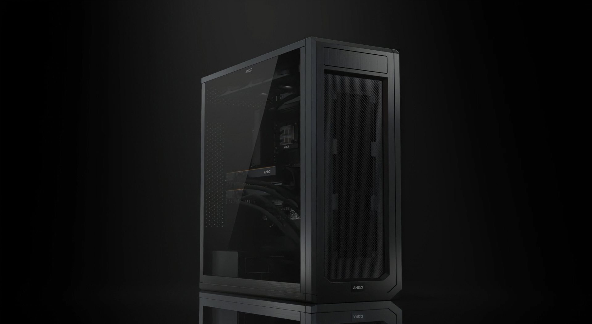 A sleek black PC case with clear side paneling, featuring visible AMD branding on multiple components inside, against a dark background.