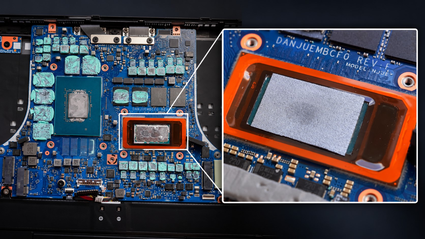 A detailed view of a laptop's motherboard featuring a central chip, surrounded by thermal paste, with a close-up showing the chip labeled 'DANJUEMBCF0 REV.F MODEL: NJU6'.