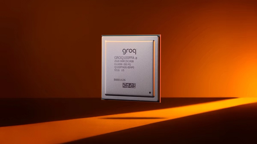 A Groq chip model 'GROQ-01Q0FFA' is showcased against an orange background.