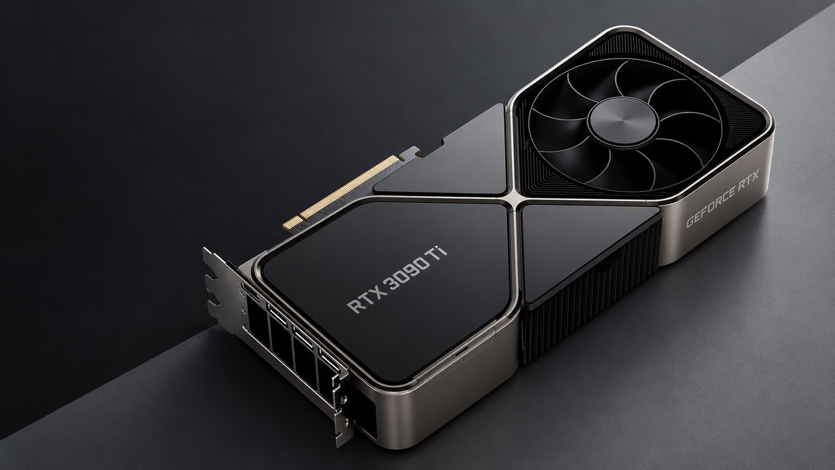An NVIDIA GeForce RTX 3090 Ti graphics card is displayed on a dark surface, featuring the model name prominently on the casing.