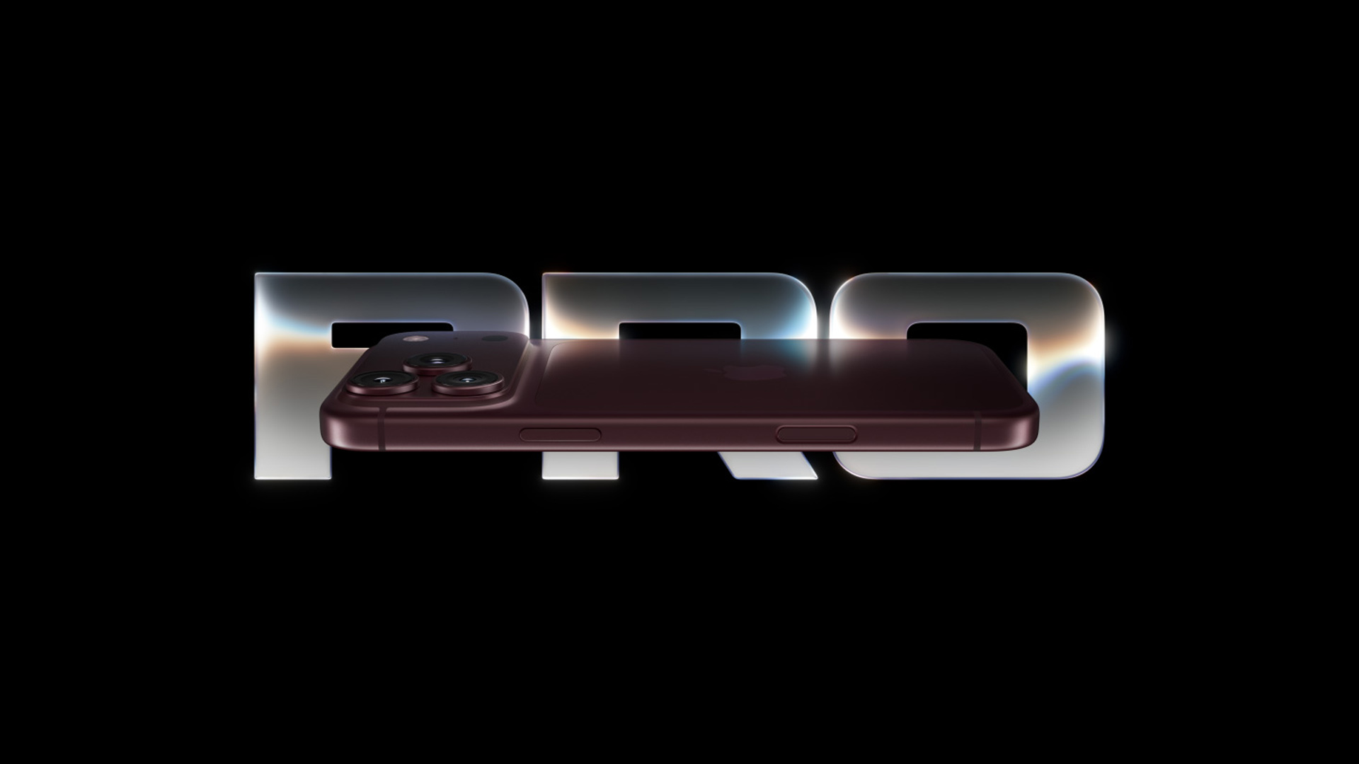 The image shows an Apple iPhone 15 Pro in a dark finish, positioned horizontally, with the word 'Pro' prominently displayed in the background.